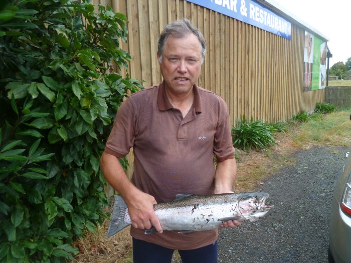 A happy angler with a good fish taken from the Bridge Pool
