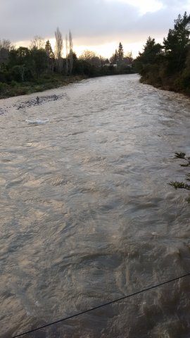 Angler chancing is luck in receding flood waters