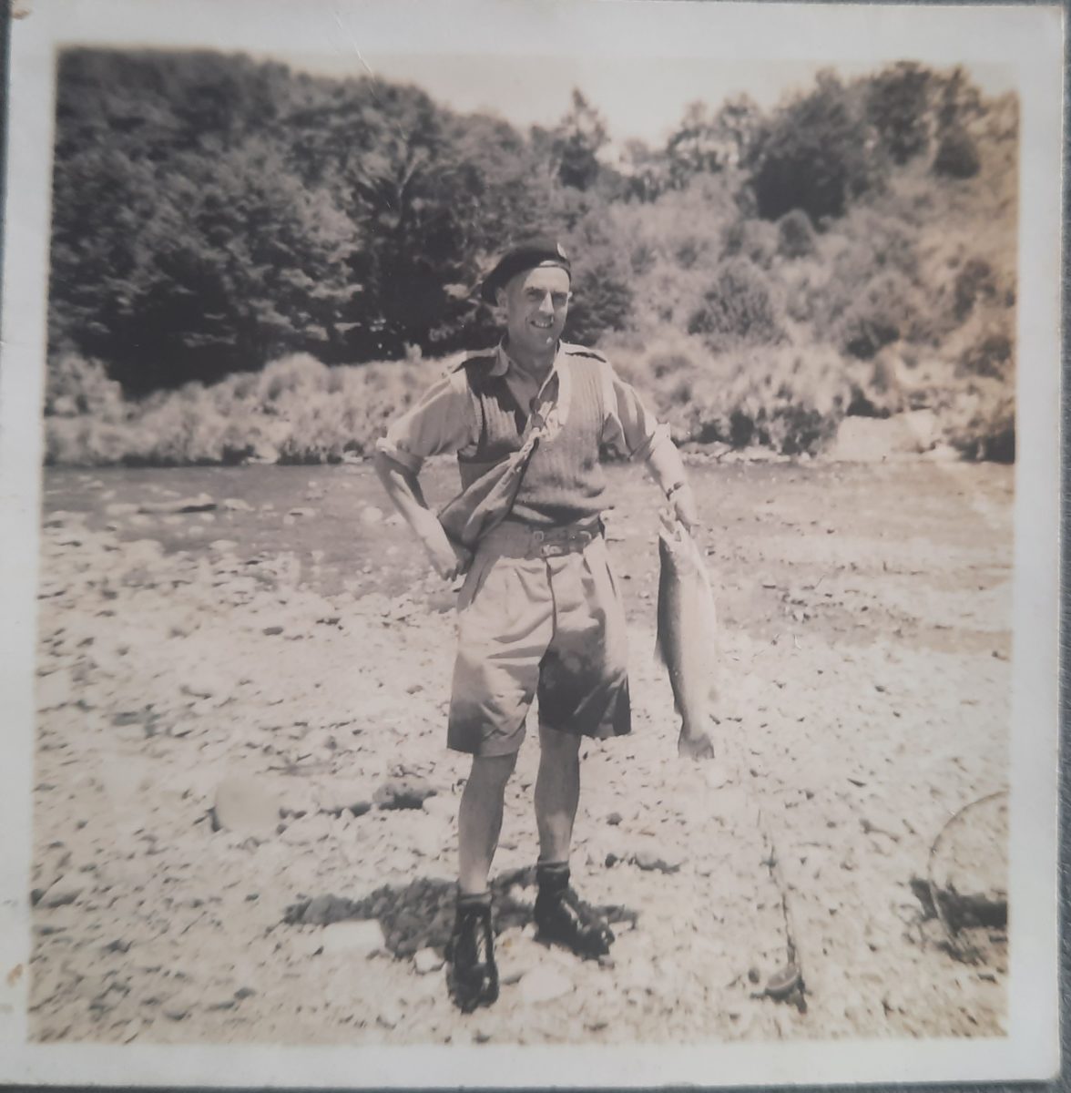 Jim Rutherford taking a breather from tank training WW2 on the Tongariro River.